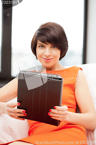 Image of happy woman with tablet pc computer
