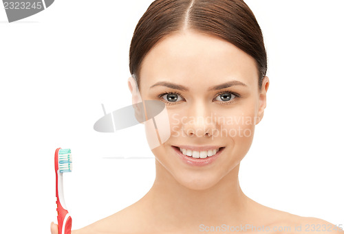 Image of beautiful woman with toothbrush