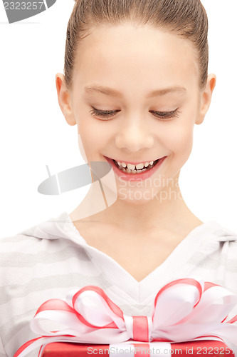Image of happy teenage girl with gift box