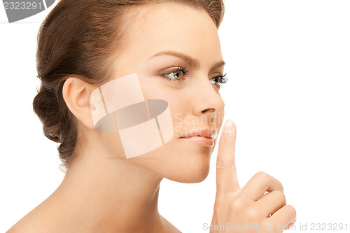 Image of finger on lips
