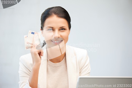 Image of lovely woman with euro cash money