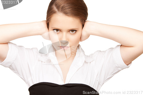 Image of woman with hands on ears