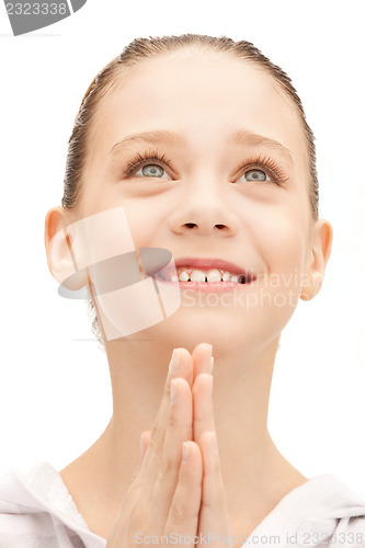 Image of praying teenage girl