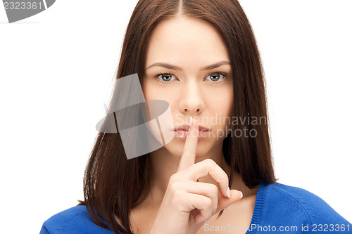 Image of finger on lips