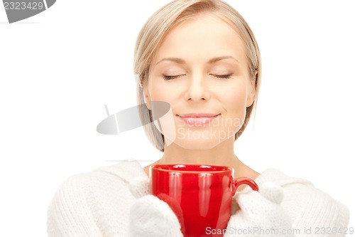 Image of woman with red mug