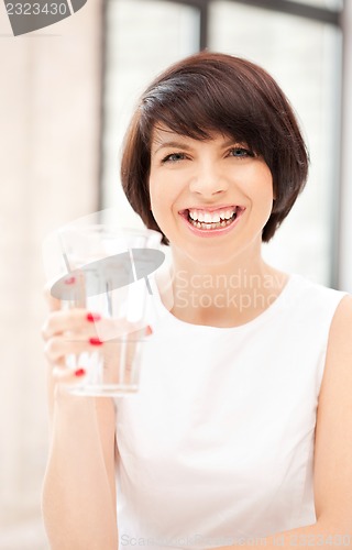 Image of beautiful woman with glass of water
