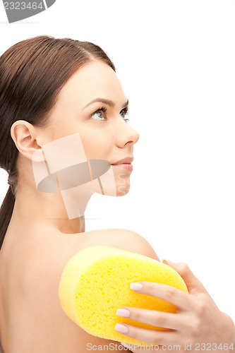 Image of beautiful woman with sponge