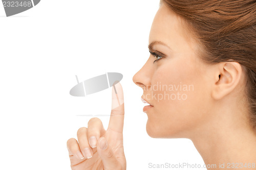 Image of finger on lips