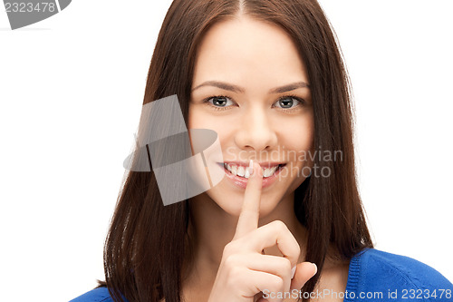 Image of finger on lips