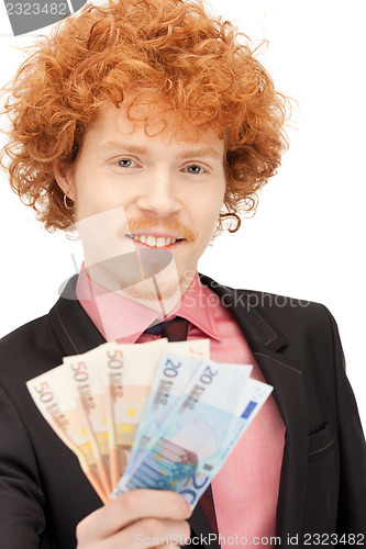 Image of handsome man with euro cash money