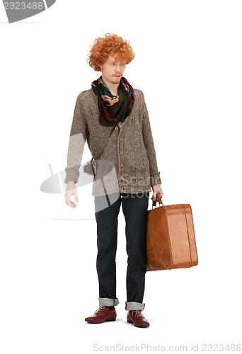 Image of man with suitcase