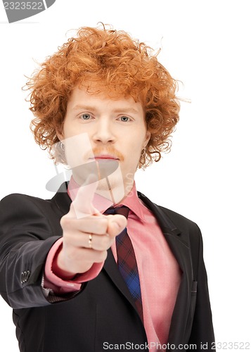 Image of businessman pointing his finger