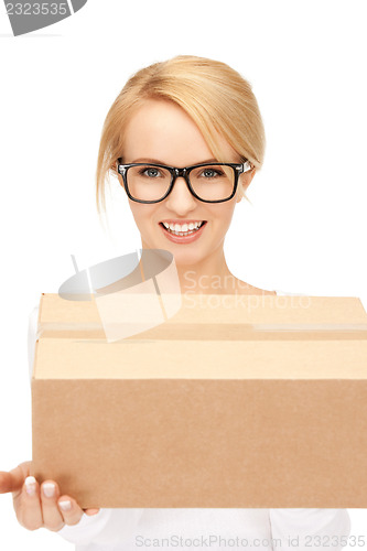 Image of attractive businesswoman with cardboard box