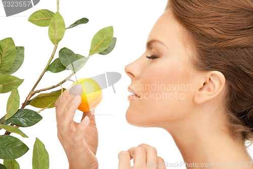 Image of lovely woman with lemon twig