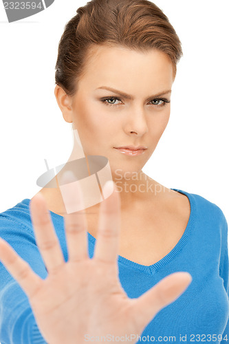 Image of woman making stop gesture