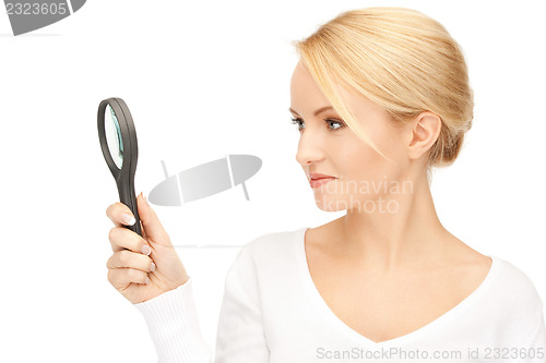 Image of woman with magnifying glass