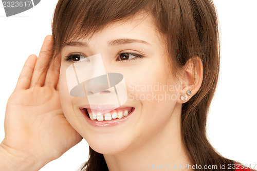 Image of teenage girl listening gossip