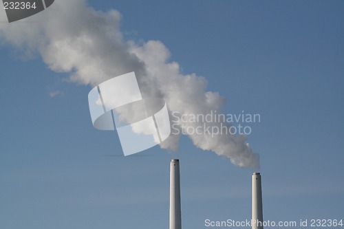 Image of white smoke on blue sky