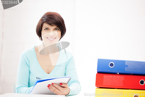 Image of woman with folders