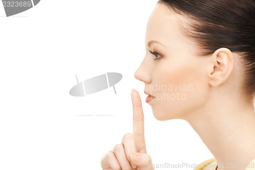 Image of finger on lips