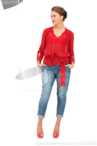 Image of lovely woman in red blouse and jeans