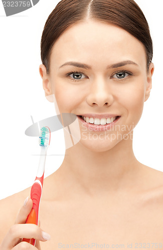 Image of beautiful woman with toothbrush