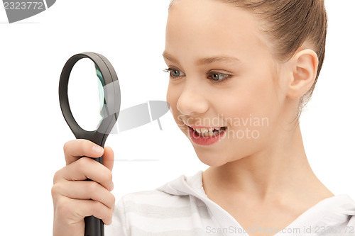 Image of teenage girl with magnifying glass