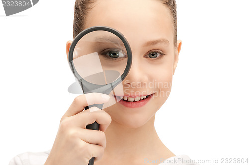 Image of teenage girl with magnifying glass