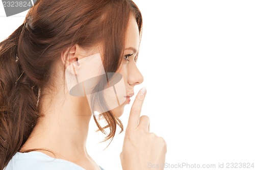 Image of finger on lips