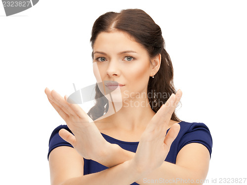 Image of woman making stop gesture