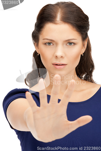 Image of woman making stop gesture