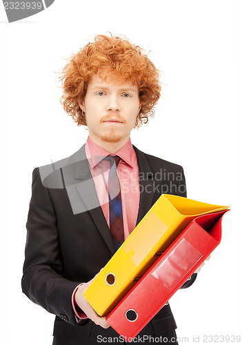 Image of man with folders