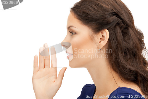 Image of woman whispering gossip