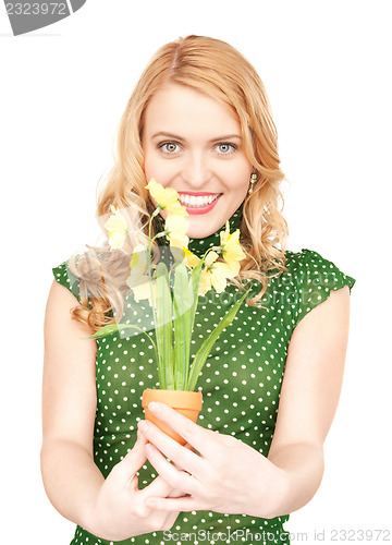 Image of lovely housewife with flower