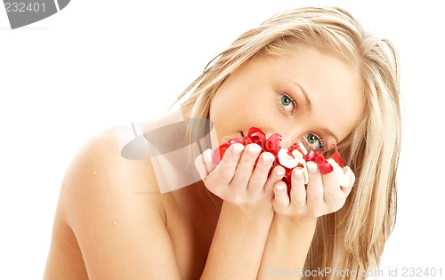 Image of lovely blond in spa with red and white rose petals #2