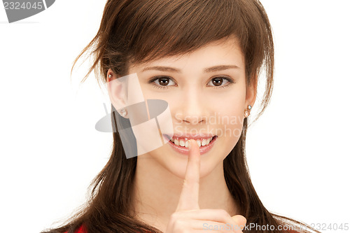 Image of finger on lips
