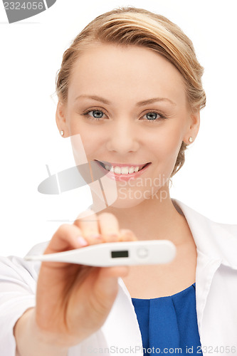 Image of attractive female doctor with thermometer