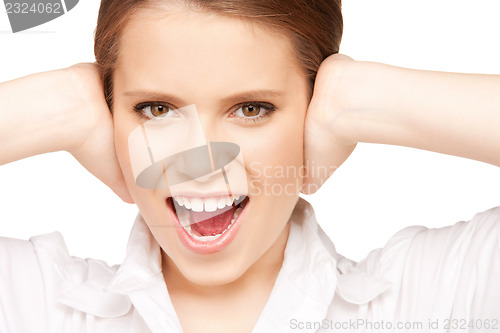 Image of woman with hands on ears