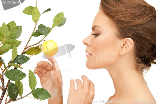Image of lovely woman with lemon twig