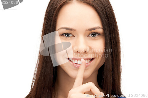 Image of finger on lips