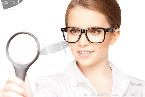 Image of woman with magnifying glass