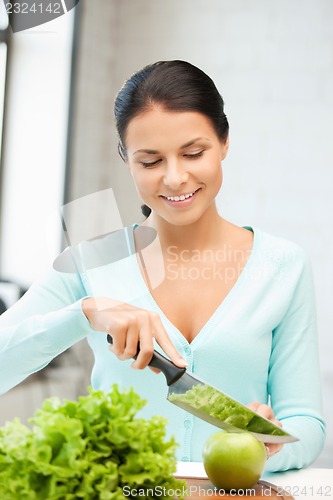 Image of beautiful woman in the kitchen