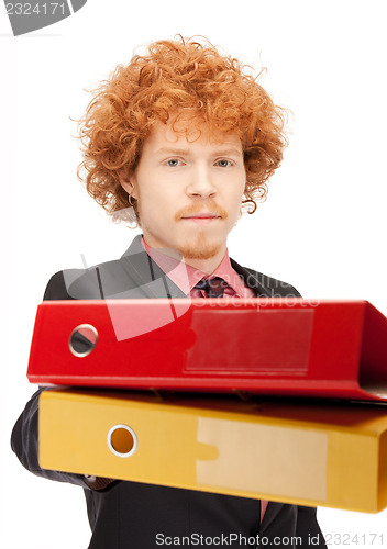 Image of man with folders