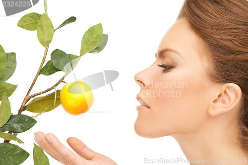 Image of lovely woman with lemon twig