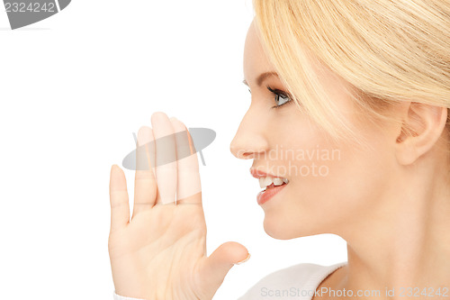 Image of woman whispering gossip