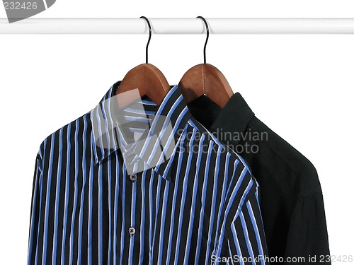 Image of Two shirts on a rack