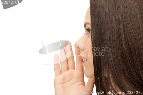 Image of woman whispering gossip