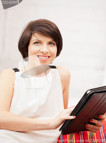 Image of happy woman with tablet pc computer