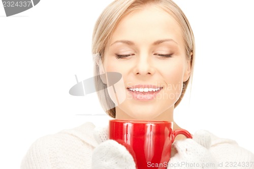 Image of woman with red mug