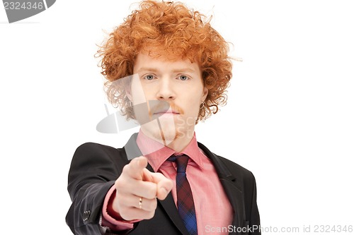 Image of businessman pointing his finger